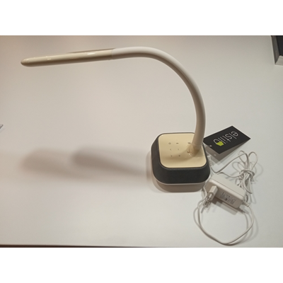 Desk lamp with a white speaker