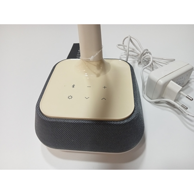 Desk lamp with a white speaker
