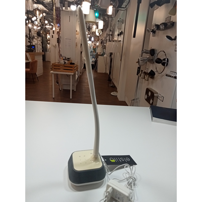 Desk lamp with a white speaker