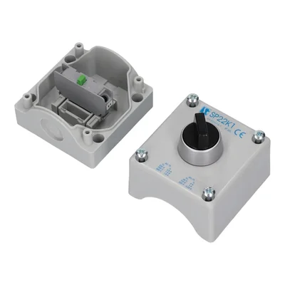 K1 control pendant with a STOP button, a button with a rotary pen drive